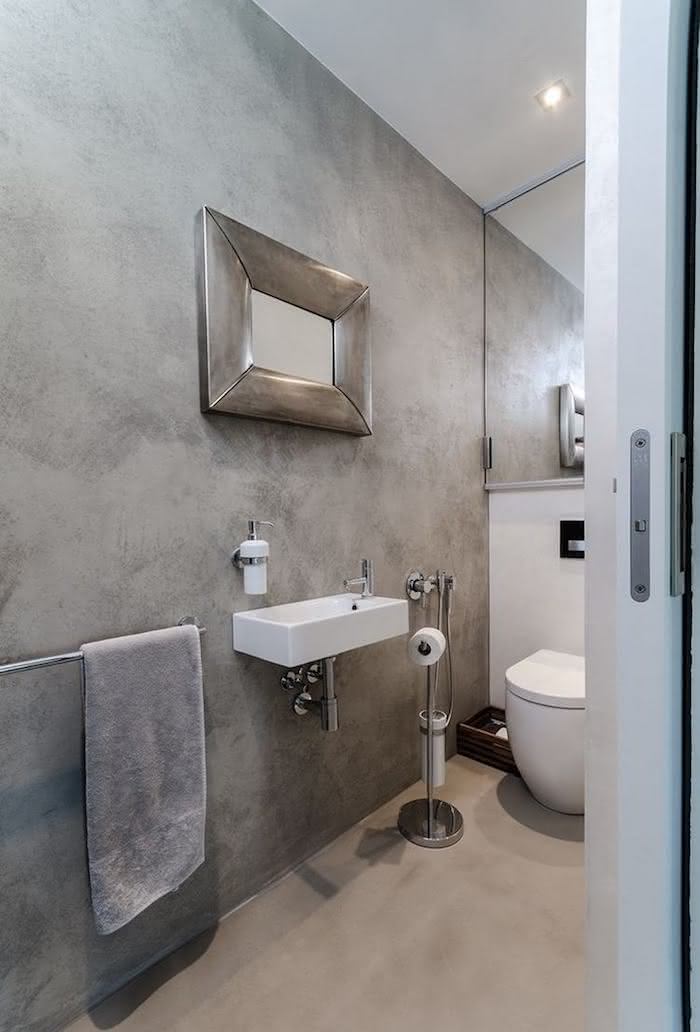 5 ideias para transformar seu banheiro com concreto: Do industrial ao minimalista; Como usar cimento queimado no box do banheiro: Guia completo; Cubas de concreto artesanais: O toque de luxo que seu lavabo precisa; Metais pretos e grafite: A combinação perfeita para banheiros de concreto; Elementos naturais no banheiro de concreto: Traga aconchego e sofisticação.