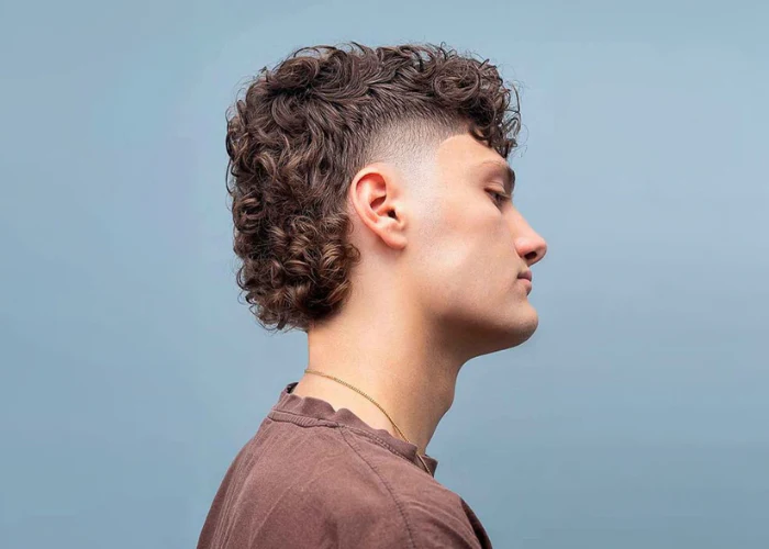 corte masculino cacheado médio
