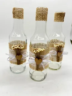 garrafas de vidro decoradas com juta