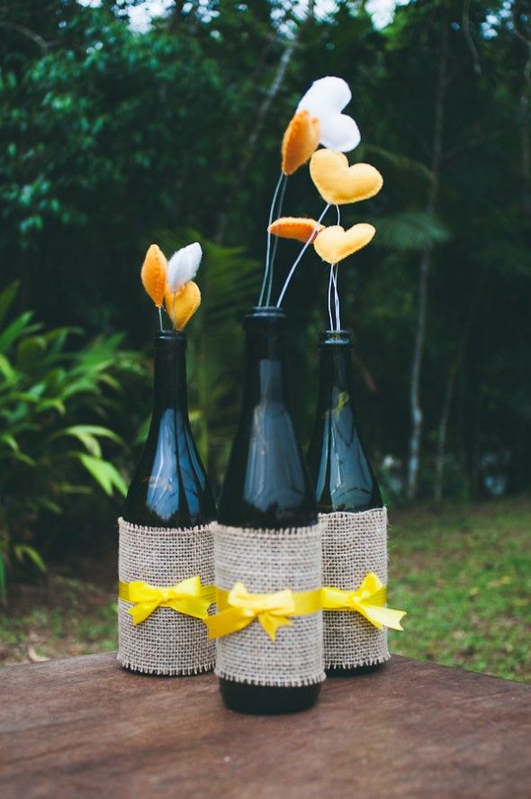 garrafas de vidro decoradas com juta