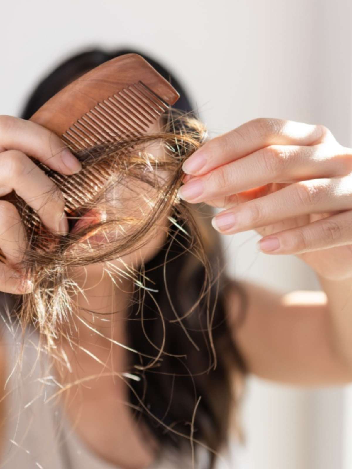 sonhar com cabelo caindo em tufos